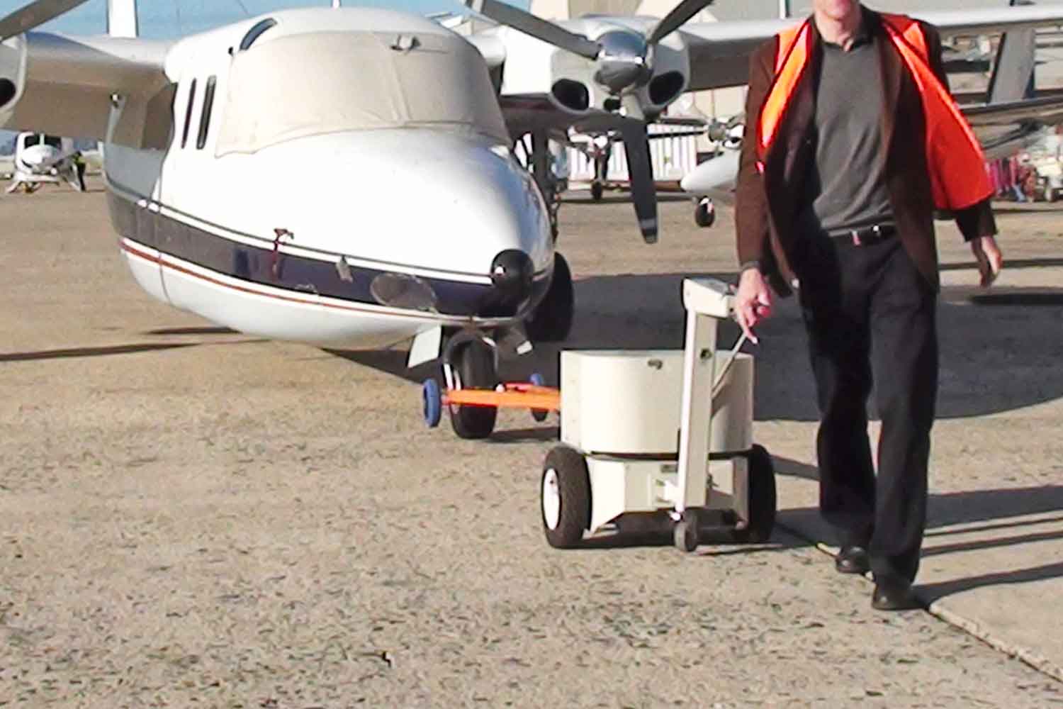 Electrodrive's Tug Axis towing a light aircraft