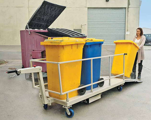 Powered Bin Trolley parked with 3 wheelie bins